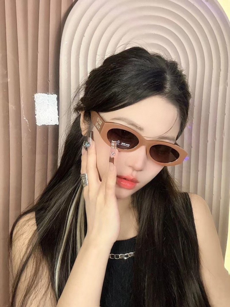 Miu miu Sunglasses